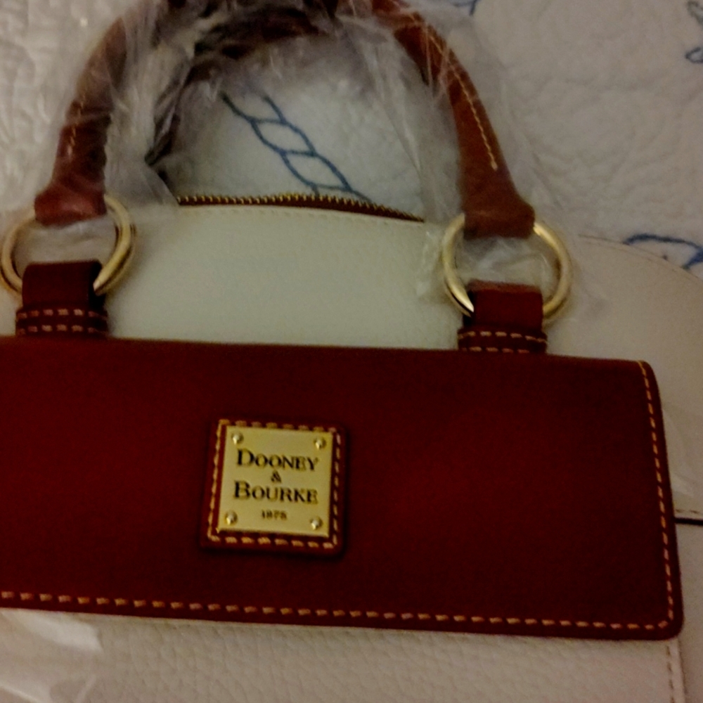 New condition Dooney/Burke purse with makeup bag and holder bag